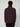 A person with short curly hair is seen from behind, wearing a dark maroon PROJEK RAW MENS CHENILLE MOCK NECK SWEATER and black pants, standing against a plain light gray background.