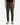 A person wearing PROJEK RAW’s SOLID BUNGEE PULL ON JOGGER in olive green, paired with a black shirt and tan lace-up boots, stands facing forward against a plain white background.