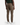 A person is shown from the back, standing with their hands at their sides against a plain white background, wearing the PROJEK RAW SOLID BUNGEE RELAXED FIT CARGO JOGGER in brown, paired with white sneakers and a dark green shirt.