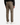 A person wearing the PROJEK RAW SOLID BUNGEE RELAXED FIT CARGO PANT, paired with a black long-sleeve shirt and white sneakers, is standing with their back facing the camera.