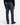 A person wearing the PROJEK RAW SOLID BUNGEE LOOSE FIT CARGO PANT for men in navy blue, paired with a black sweater and black shoes, is standing facing away to showcase the comfortable stretch fabric and utility pockets on the back of these cargo pants.