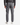 A person is shown from the back standing against a white background, wearing PROJEK RAW’s SOLID BUNGEE 5-POCKET RELAXED FIT PANTS—crafted in a premium stretch blend and styled in a versatile men’s silhouette—paired with a dark ribbed sweater and white sneakers.