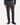 A person wearing PROJEK RAW PLAID BUNGEE CLASSIC FIT CHINO PANTS, a dark long-sleeve shirt, and black dress shoes stands against a plain white background.