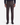 A person standing, wearing PROJEK RAW MINI HOUNDSTOOTH TEXTURED BUNGEE CLASSIC FIT CHINO PANT in dark brown with a subtle mini houndstooth pattern, paired with a dark sweater and black dress shoes, shown from the waist down against a white background.