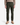 A person stands facing forward against a plain white background, wearing PROJEK RAW CANVAS BUNGEE CLASSIC FIT 5-POCKET PANTS in olive green, paired with a beige long-sleeve shirt and tan lace-up boots.