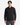 A person wearing the PROJEK RAW CANVAS TWILL BUNGEE SHIRT, featuring button-up styling, flap pockets, and rugged construction in black canvas twill, stands facing forward against a plain white background.