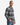A man stands with one hand in his jeans pocket, wearing the PROJEK RAW PLAID FLANNEL SHIRT in gray plaid, looking at the camera against a plain white background.