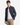 A young man wears the PROJEK RAW CORDUROY RELAXED FIT SHIRT over a white tank top and beige pants, standing against a plain white background for all-day comfort.