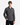 A young man with short brown hair is seen wearing the PROJEK RAW KNIT FLANNEL SHIRT in a classic cut, featuring chest pockets, styled with black pants and standing against a plain white background.