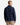 A man with short hair is facing away, wearing the PROJEK RAW FLANNEL PLAID OVERSHIRT in blue and black with a relaxed fit, paired with khaki pants, standing against a plain white background.