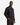 A man wearing the PROJEK RAW FLANNEL PLAID OVERSHIRT with a relaxed fit and brown pants stands with one hand in his pocket, looking at the camera against a plain white background.