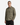 A man wearing the PROJEK RAW TWILL OVERSHIRT in olive green, featuring two chest pockets, stands with one hand in his pocket and looks at the camera against a plain white background—an ideal choice for transitional weather.