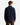 A man stands facing away against a plain white background, wearing the PROJEK RAW BONDED FLEECE PLAID OVERSHIRT styled as a button-up shirt jacket in navy blue and black plaid, paired with brown cargo pants.