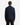A person is standing facing away from the camera, wearing the PROJEK RAW BUNGEE SOLID ZIPPER OVERSHIRT in dark navy with a relaxed silhouette, paired with black pants against a plain white background.