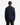 A person stands facing away, wearing the PROJEK RAW BUNGEE SOLID ZIPPER OVERSHIRT in dark navy paired with black pants against a plain white background. The image displays the back view of this utility-inspired outfit.