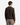 A person is standing with their back to the camera, wearing the PROJEK RAW CHUNKY FAUX CASHMERE SWEATER in a cozy brown shade paired with light gray cargo pants against a plain white background.