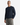 A man wearing the PROJEK RAW HONEYCOMB CHENILLE SWEATER in navy blue and light gray drawstring pants stands with one hand in his pocket against a plain white background, highlighting this cozy essential for effortless style.