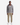 A man faces forward wearing the PROJEK RAW BONDED CHENILLE ZIP-UP HOODIE in gray over a white shirt, paired with khaki pants and white sneakers. He stands with a neutral expression and his hands at his sides against a plain white background.