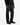A person is shown from the waist down, standing against a white background, wearing black baggy-fit denim jeans (DREW BAGGY FIT DENIM by PROJEK RAW), paired with a black long-sleeve shirt and black shoes.