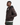 A man stands in profile against a plain white background, wearing the PROJEK RAW TWILL BOMBER JACKET featuring a black hood and practical utility sleeve pocket, paired with green pants.