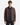 A young man stands facing forward against a plain white background, wearing the MEN’S VEGAN SUEDE MOTO JACKET by PROJEK RAW—with quilted shoulders—layered over a navy shirt and paired with black jeans.