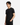 A person with straight black hair wears the PROJEK RAW LUX ESSENTIAL JERSEY T-SHIRT and black pants, standing with one hand in their pocket against a plain white background—an understated look that spotlights this men’s t-shirt as a modern urban essential.