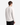 A person with short brown hair is standing with their back to the camera, wearing the PROJEK RAW LUX ESSENTIAL JERSEY LONG SLEEVE T-SHIRT and dark pants against a plain white background—a true wardrobe staple for any season.