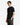 A man with straight black hair stands with one hand in his pocket against a white background, wearing the PROJEK RAW CREWNECK SCUBA T-SHIRT in plain black paired with olive green pants.