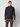 A young man stands against a plain light background, wearing the PROJEK RAW Mens Half-zip Cashmere Touch Sweater in dark gray with brown cargo pants. He faces forward, arms relaxed at his sides, with a neutral expression.