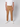 A person models the PROJEK RAW Mens Bungee Relaxed Chino Pant in tan, paired with a white short-sleeve shirt and white sneakers, standing facing forward against a plain light background. Image is cropped at the shoulders.
