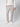 A person wearing PROJEK RAW Men’s Stretch Bungee Cargo Jogger in light beige, a white textured sweater, and white sneakers stands against a plain light background with one hand in their pocket.