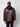 A man with short hair, dressed in black pants, faces away from the camera wearing the PROJEK RAW Mens Vegan Leather Moto Jacket with Removable Hood. The jacket features visible stitching and is set against a plain light background.